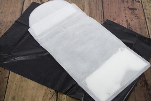 嘔吐しそうなときは袋や容器に吐くと安心